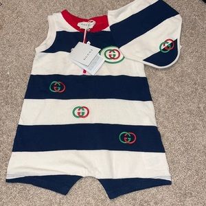 Gucci baby one piece unisex could be for girl or boy brand new comes with bib